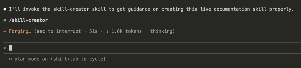 Claude Code terminal showing the initiation of skill-creator skill with "Forging..." status indicating it's processing the request