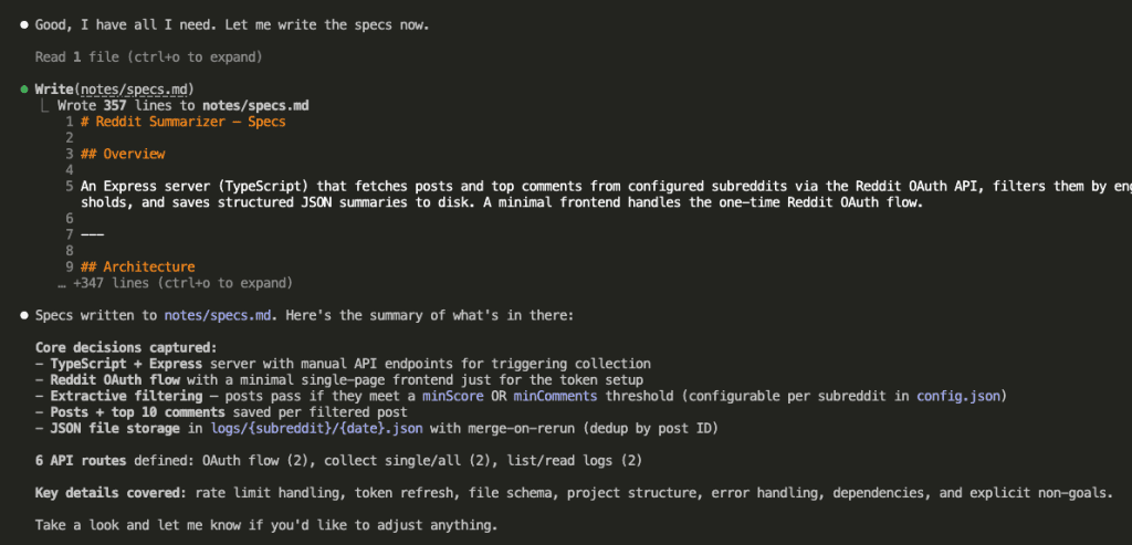 Claude Code writing the complete specs.md file based on all the answers provided