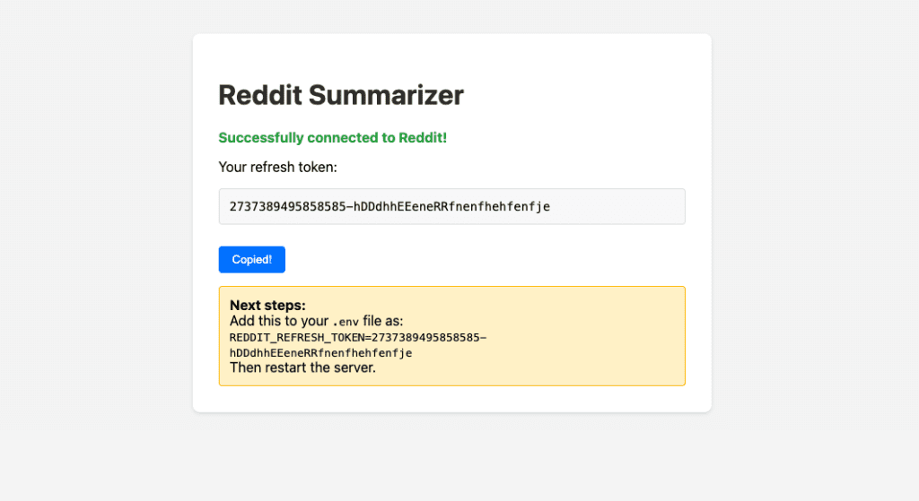 Reddit Summarizer success page showing the refresh token with a Copied button and instructions to add REDDIT_REFRESH_TOKEN to the .env file